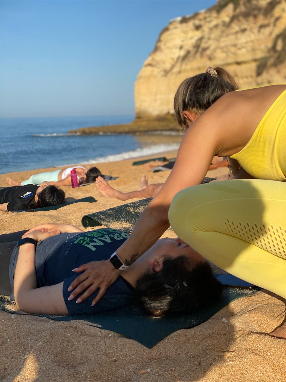 One-to-one somatic support during a retreat session, held with care